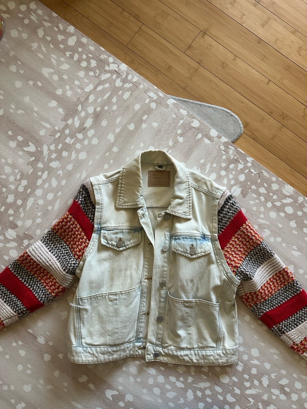 Blank NYC Women’s Light Denim Jacket with Multicolor Knit Sleeves